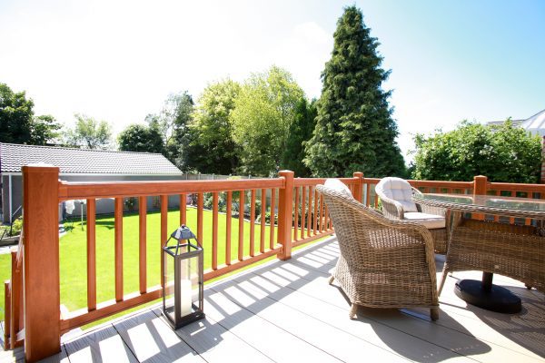 golden oak foil woodgrain deck posts with pale grey boards